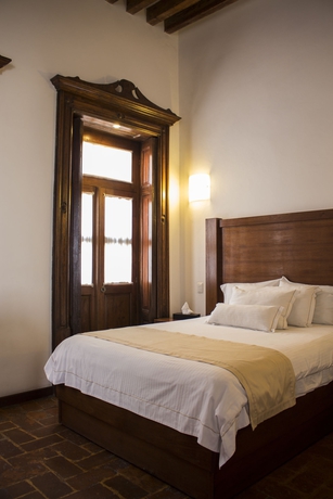 Imagen de la habitación del Boutique El Serafin Hotel. Foto 7