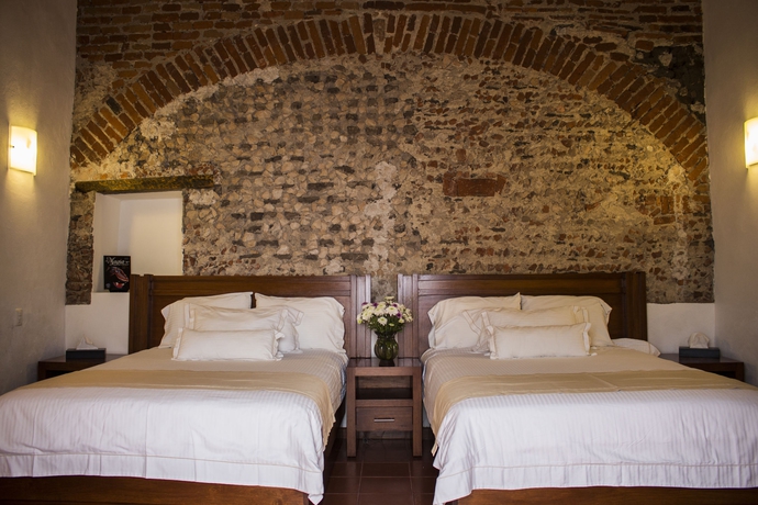 Imagen de la habitación del Boutique El Serafin Hotel. Foto 10
