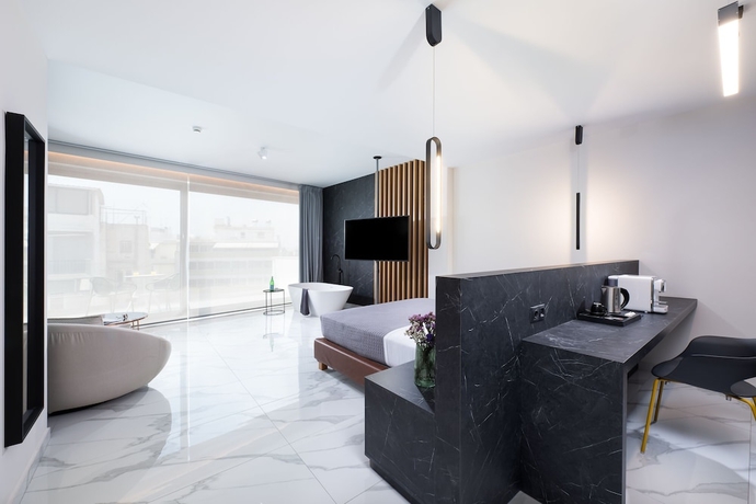 Imagen de la habitación del Boutique Enattica Suites. Foto 4