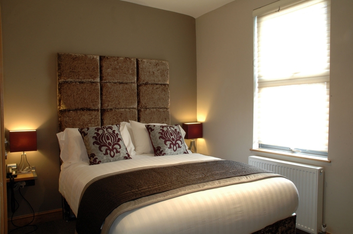 Imagen de la habitación del Boutique Homestay Hotel. Foto 9