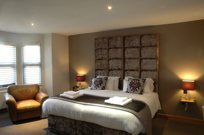 Imagen de la habitación del Boutique Homestay Hotel. Foto 10