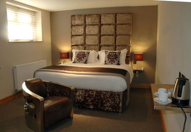 Imagen de la habitación del Boutique Homestay Hotel. Foto 11