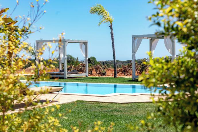 Imagen de la piscina del Boutique Hotel Al Karob Yoga. Foto 19