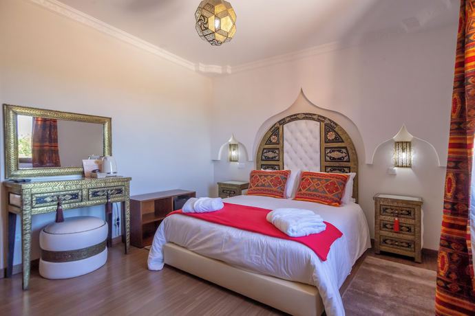 Imagen de la habitación del Boutique Hotel Al Karob Yoga. Foto 11