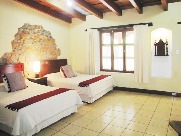 Imagen de la habitación del Boutique Hotel Cacique Real. Foto 2