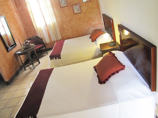 Imagen de la habitación del Boutique Hotel Cacique Real. Foto 5