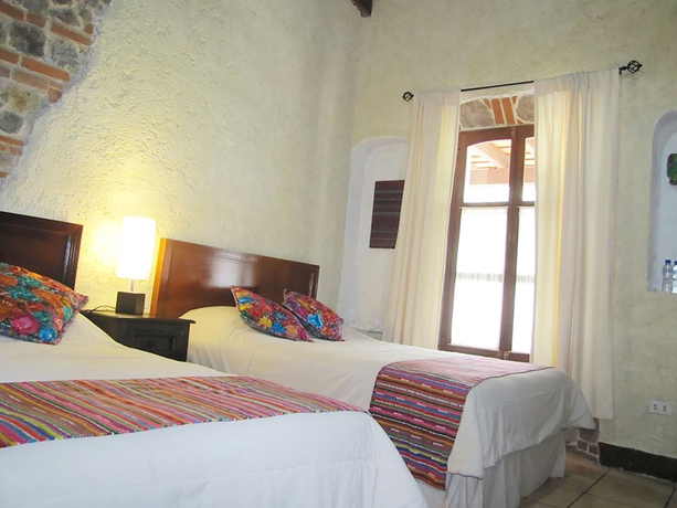 Imagen de la habitación del Boutique Hotel Cacique Real. Foto 8