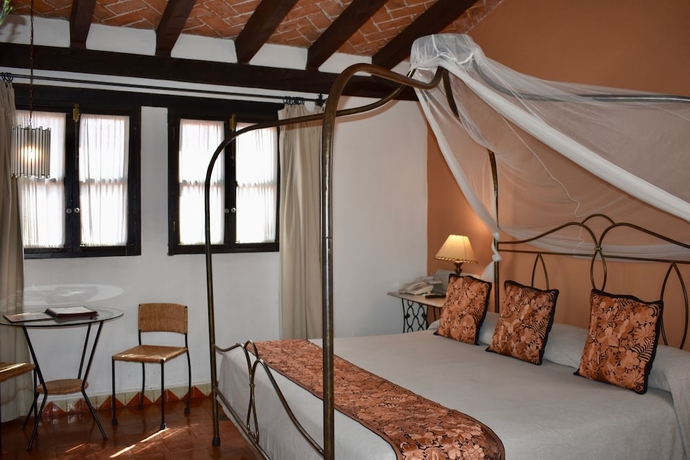 Imagen de la habitación del Boutique Hotel Casa Rosada - Adults Only. Foto 12