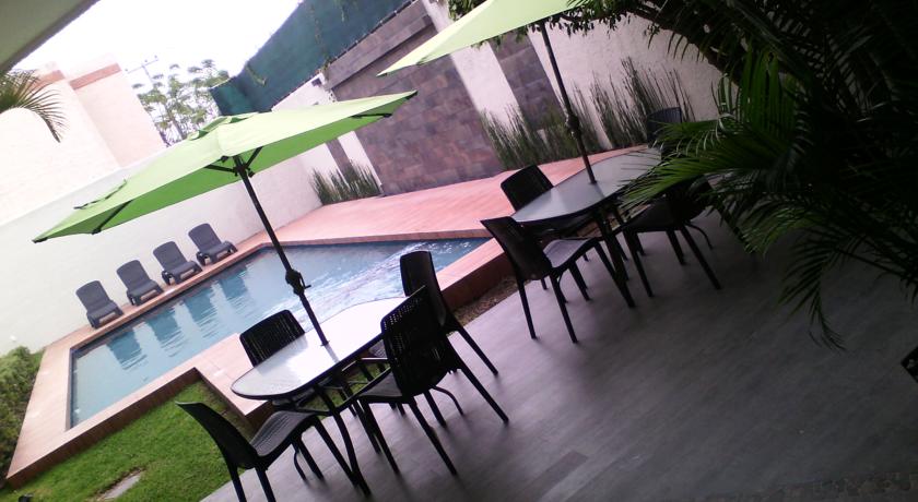Imagen de la piscina del Boutique Hotel Platino Expo. Foto 7