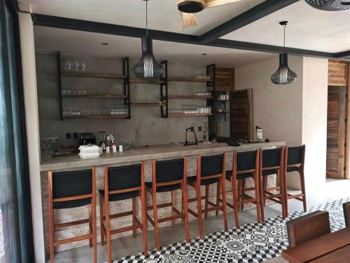 Imagen del bar/restaurante del Boutique Irie Tulum. Foto 2