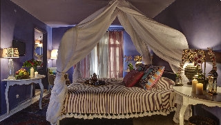 Imagen de la habitación del Boutique La Capria Suite. Foto 1