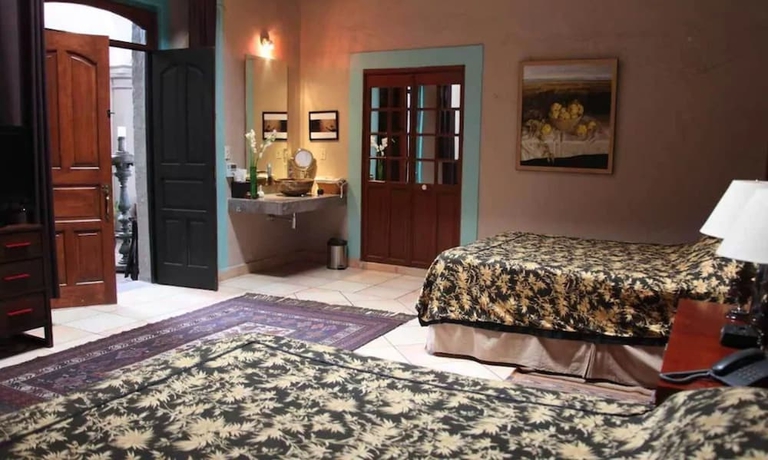 Imagen de la habitación del Boutique La Casa Del Atrio. Foto 8