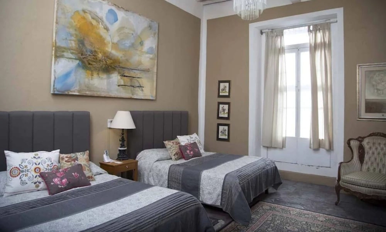 Imagen de la habitación del Boutique La Casa Del Atrio. Foto 10