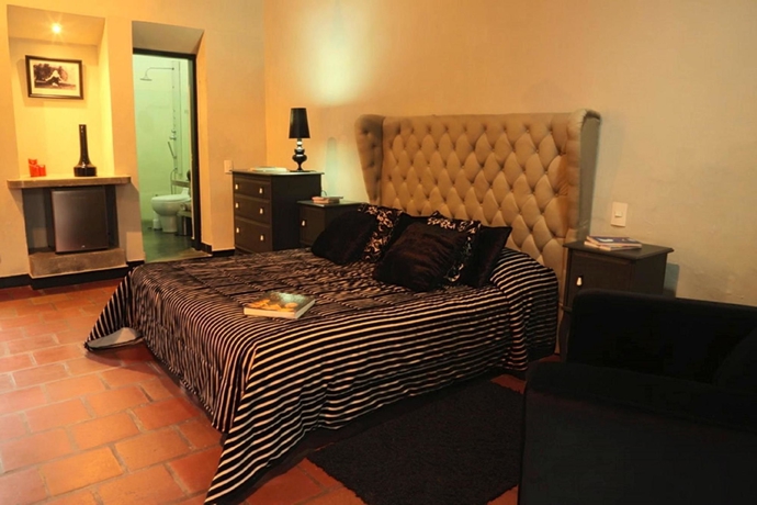 Imagen de la habitación del Boutique La Casa Del Farol Boutique. Foto 4