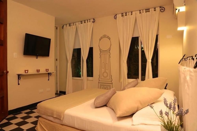 Imagen de la habitación del Boutique La Casa Del Farol Boutique. Foto 7