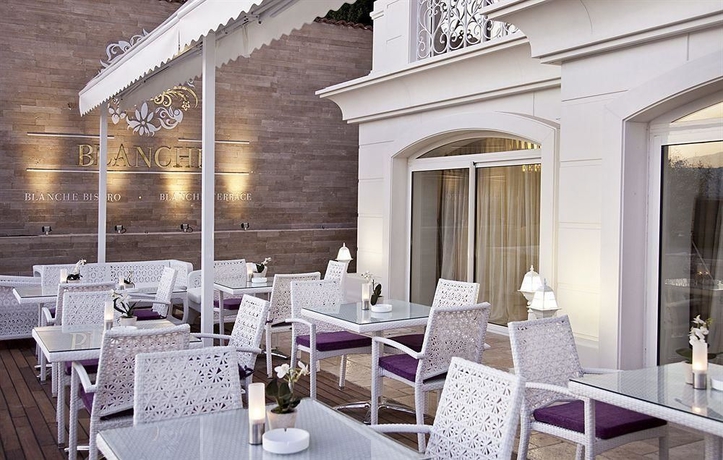 Imagen del bar/restaurante del Boutique La Hotel and Suites. Foto 2