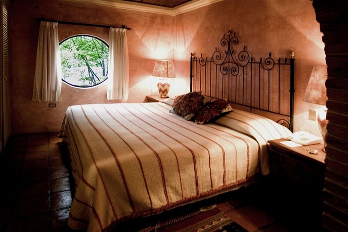 Imagen de la habitación del Boutique La Puertecita Hotel. Foto 6