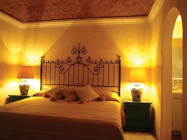 Imagen de la habitación del Boutique La Puertecita Hotel. Foto 7