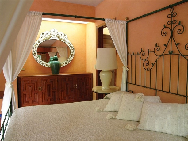 Imagen de la habitación del Boutique La Puertecita Hotel. Foto 8