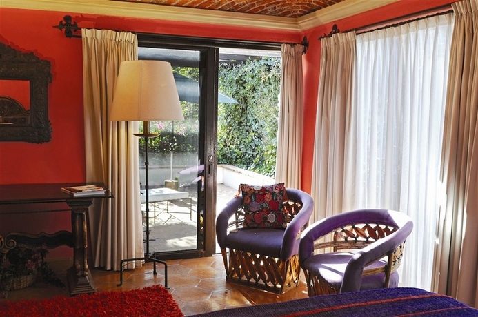 Imagen de la habitación del Boutique La Puertecita Hotel. Foto 9