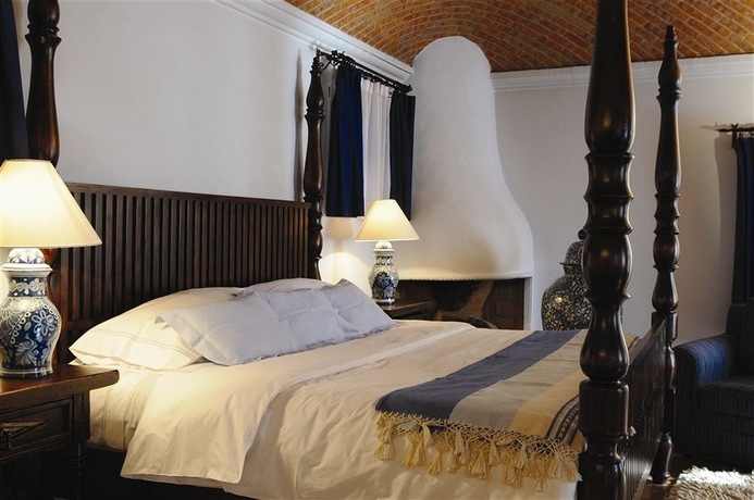 Imagen de la habitación del Boutique La Puertecita Hotel. Foto 10