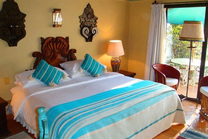 Imagen de la habitación del Boutique La Puertecita Hotel. Foto 11
