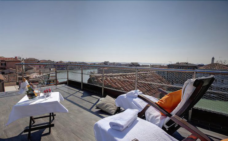 Imagen de la habitación del Boutique MURANO Suites - Venezia. Foto 12