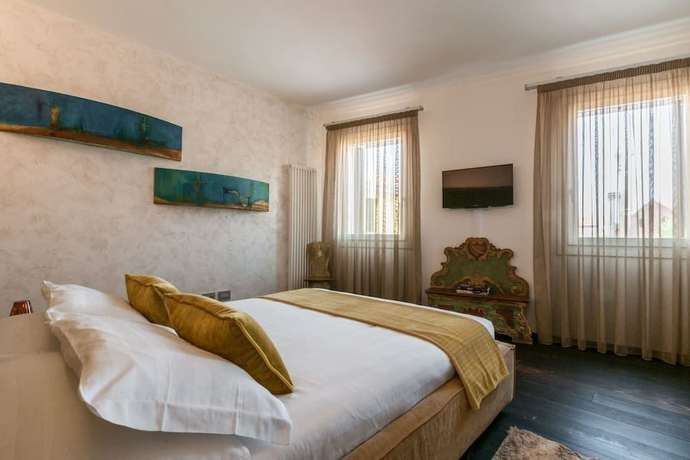 Imagen de la habitación del Boutique MURANO Suites - Venezia. Foto 19