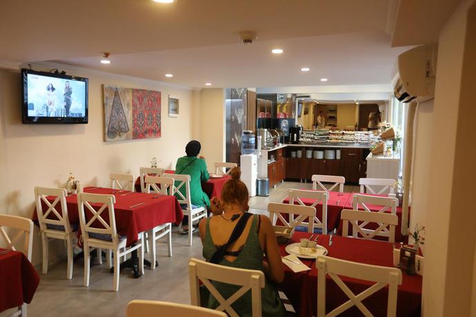 Imagen del bar/restaurante del Boutique Marmara Deluxe Hotel. Foto 2