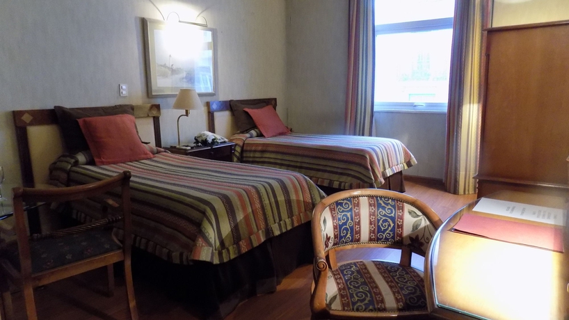 Imagen de la habitación del Boutique Mayflower Suites. Foto 7