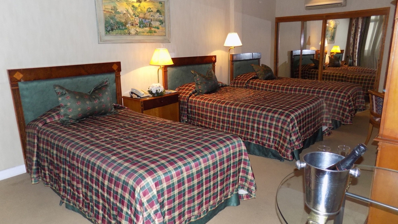 Imagen de la habitación del Boutique Mayflower Suites. Foto 10