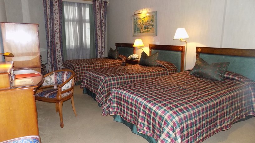 Imagen de la habitación del Boutique Mayflower Suites. Foto 11