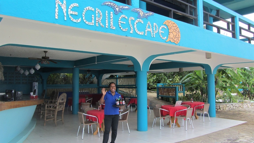 Imagen del bar/restaurante del Boutique Negril Escape Resort and Spa. Foto 7