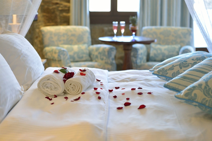 Imagen de la habitación del Boutique Nissaki Hotel. Foto 11