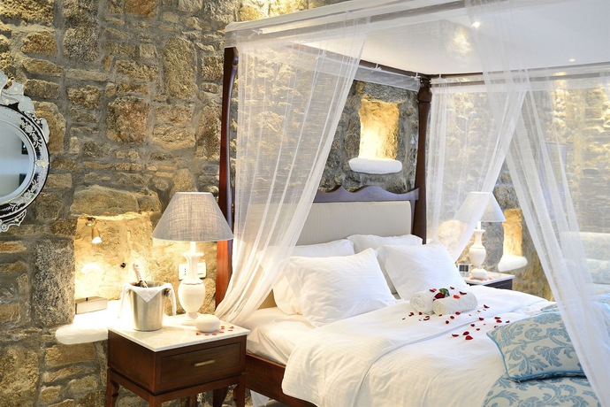 Imagen de la habitación del Boutique Nissaki Hotel. Foto 15