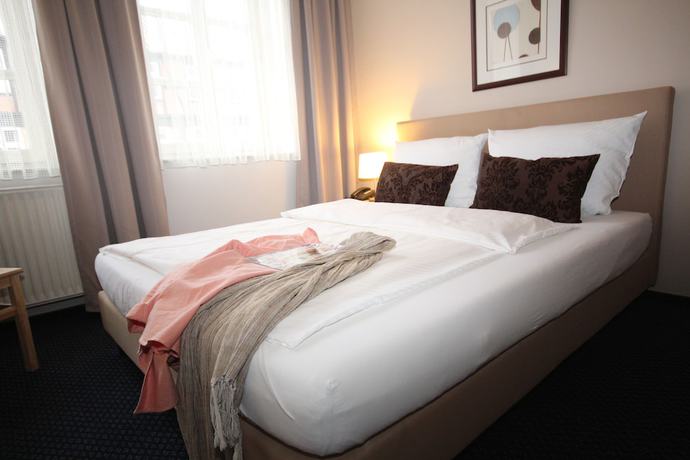 Imagen de la habitación del Boutique ONNO Hotel and Apartments. Foto 9