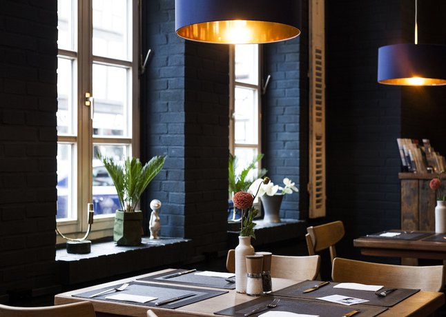 Imagen del bar/restaurante del Boutique ONNO Hotel and Apartments. Foto 2