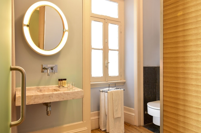 Imagen de la habitación del Boutique Palacete Chafariz D'el Rei By Unlock Hotels. Foto 17