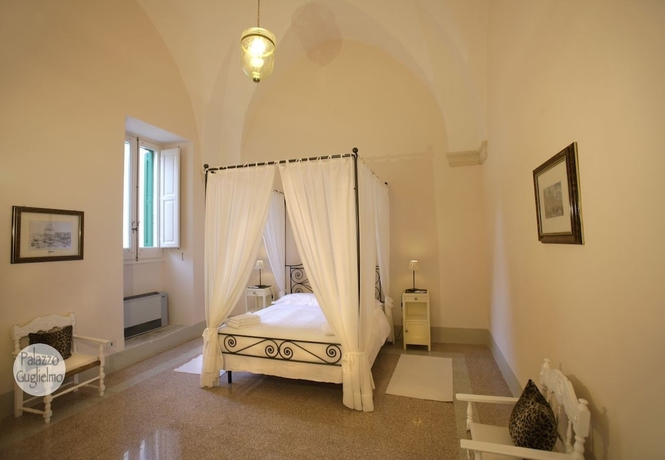 Imagen de la habitación del Boutique Palazzo Guglielmo. Foto 17