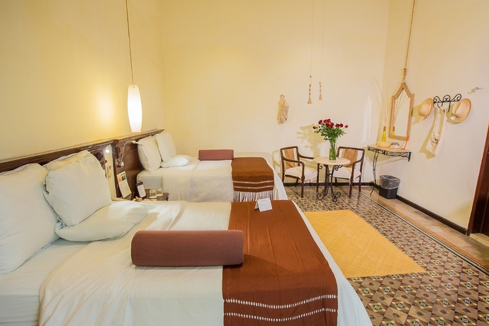 Imagen de la habitación del Boutique Piedra De Agua Hotel Mérida. Foto 8