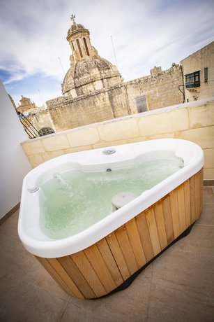 Imagen de la habitación del Boutique Pjazza Suites. Foto 2