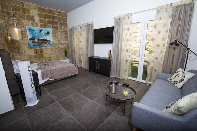 Imagen de la habitación del Boutique Pjazza Suites. Foto 3
