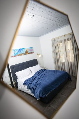 Imagen de la habitación del Boutique Pjazza Suites. Foto 4