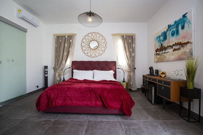 Imagen de la habitación del Boutique Pjazza Suites. Foto 5