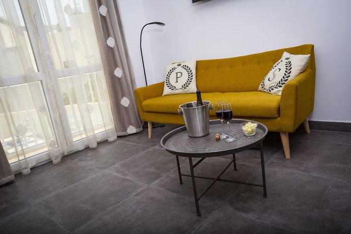 Imagen de la habitación del Boutique Pjazza Suites. Foto 6