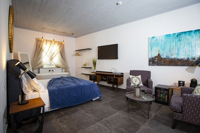 Imagen de la habitación del Boutique Pjazza Suites. Foto 7