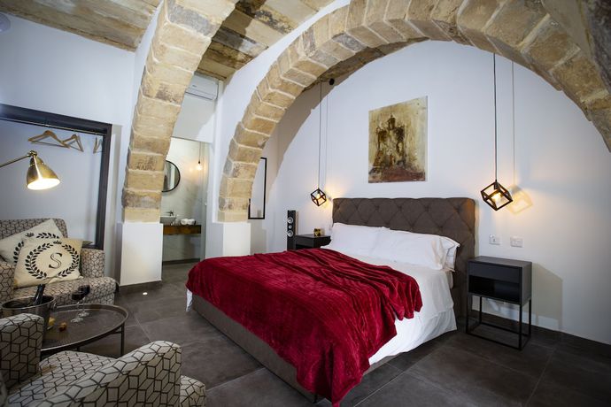 Imagen de la habitación del Boutique Pjazza Suites. Foto 10