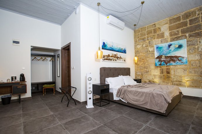 Imagen de la habitación del Boutique Pjazza Suites. Foto 12