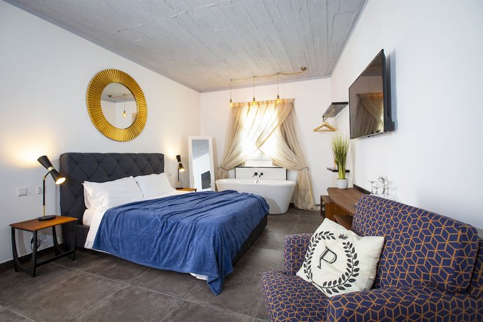Imagen de la habitación del Boutique Pjazza Suites. Foto 15