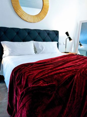 Imagen de la habitación del Boutique Pjazza Suites. Foto 17
